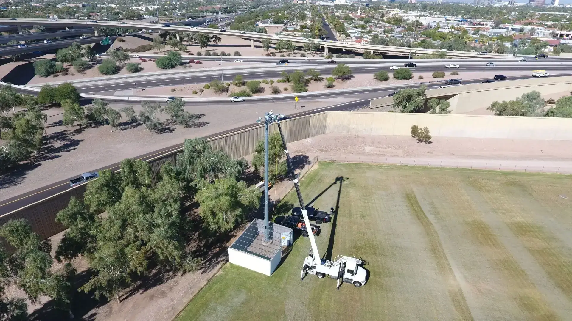 A crane is in the middle of an aerial view.